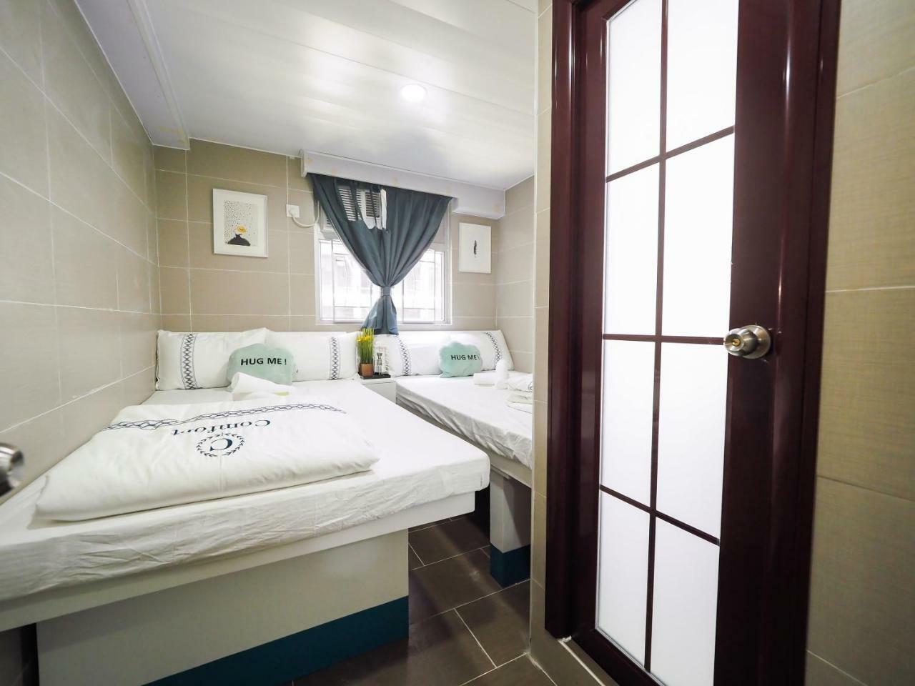 Smiley Inn Цзюлун Экстерьер фото